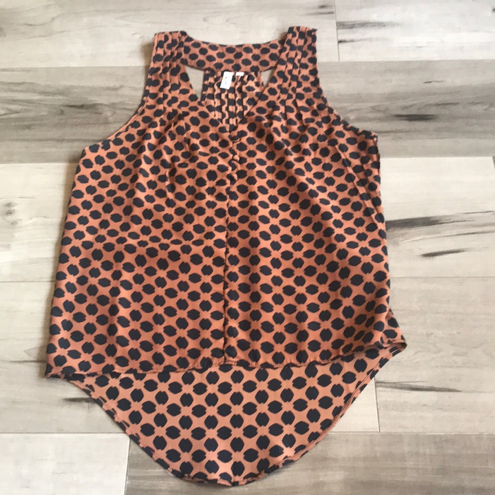 Sleeveless blouse with button front